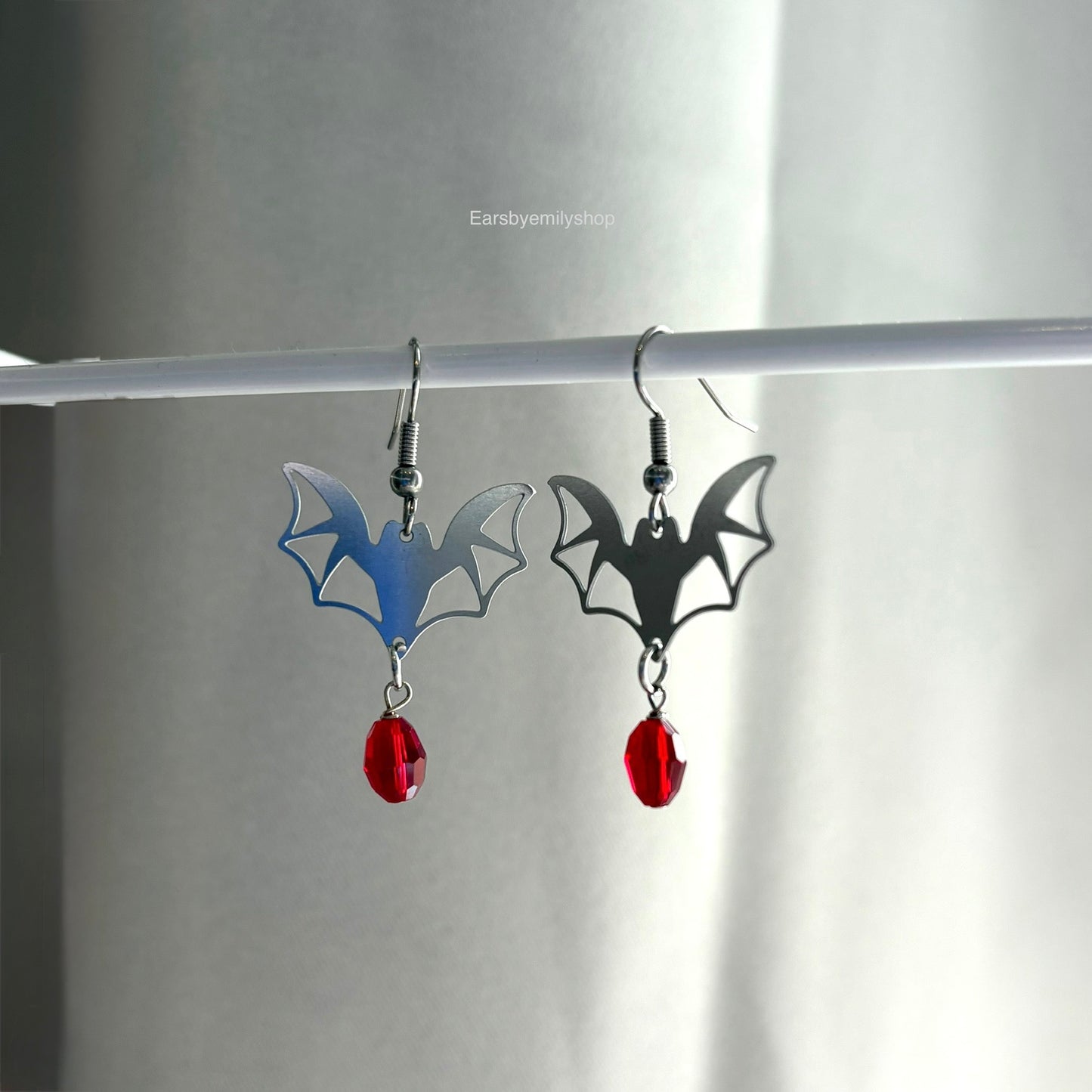 Stainless steel bat with red bead hypoallergenic earrings