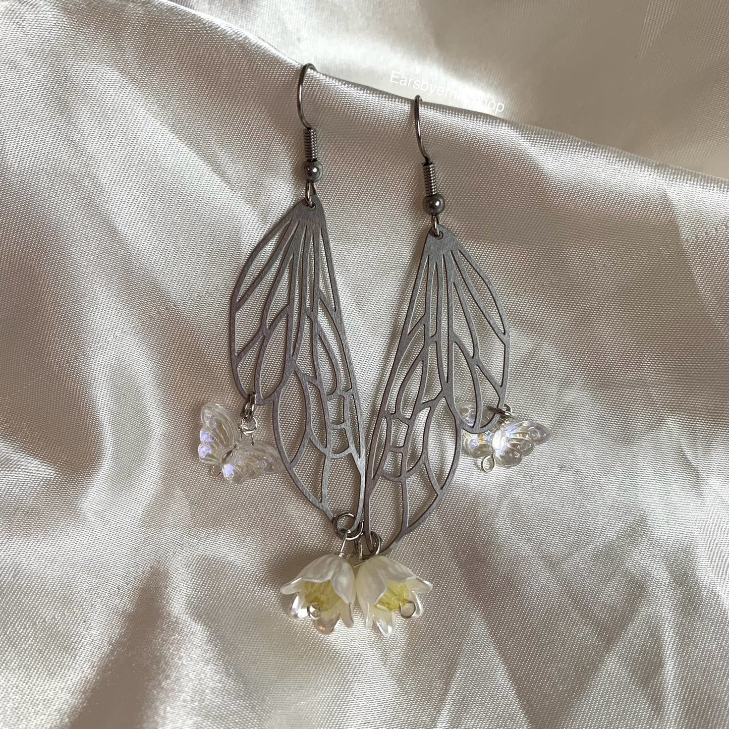 Silver stainless steel butterfly fairy wing earrings with yellow flowers