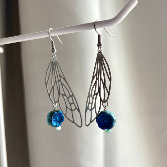 Stainless steel silver fairy wing dangle earrings with blue reversible blue flowers
