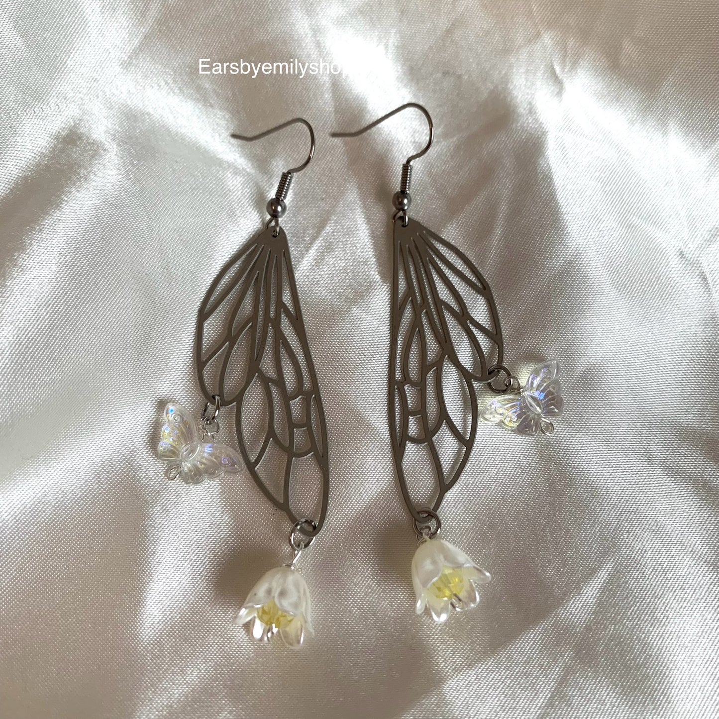 Silver stainless steel butterfly fairy wing earrings with yellow flowers