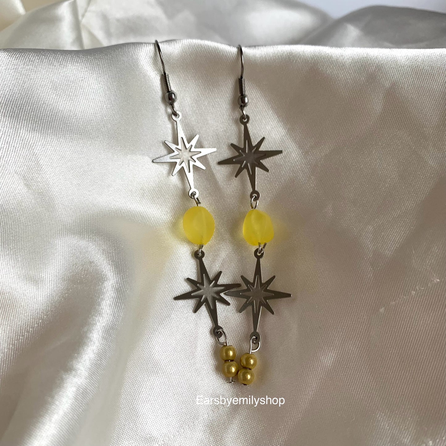 Stainless steel star and yellow bead statement dangle earrings