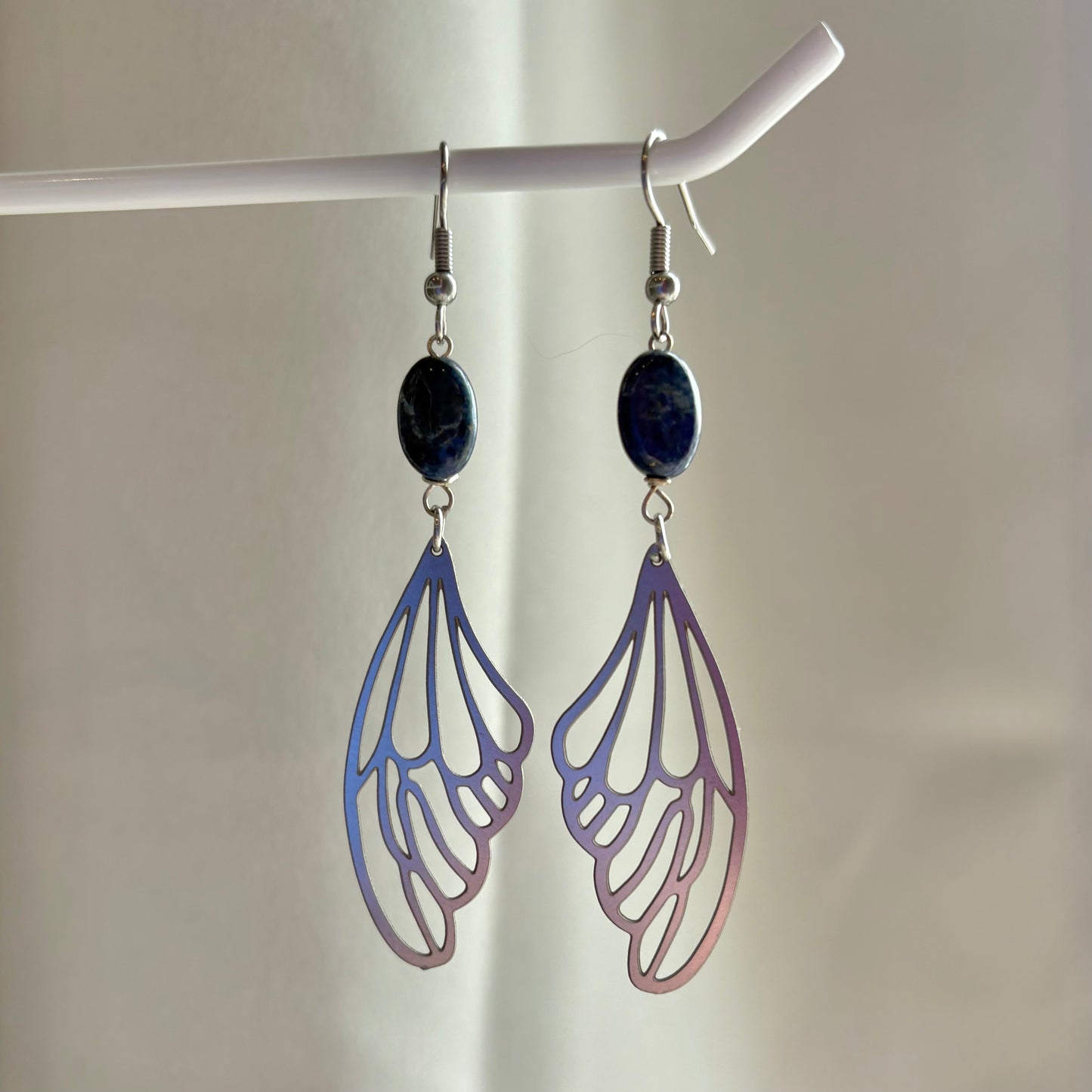 Stainless steel fairy butterfly wing dangle earrings with blue lapis lazuli oval crystals