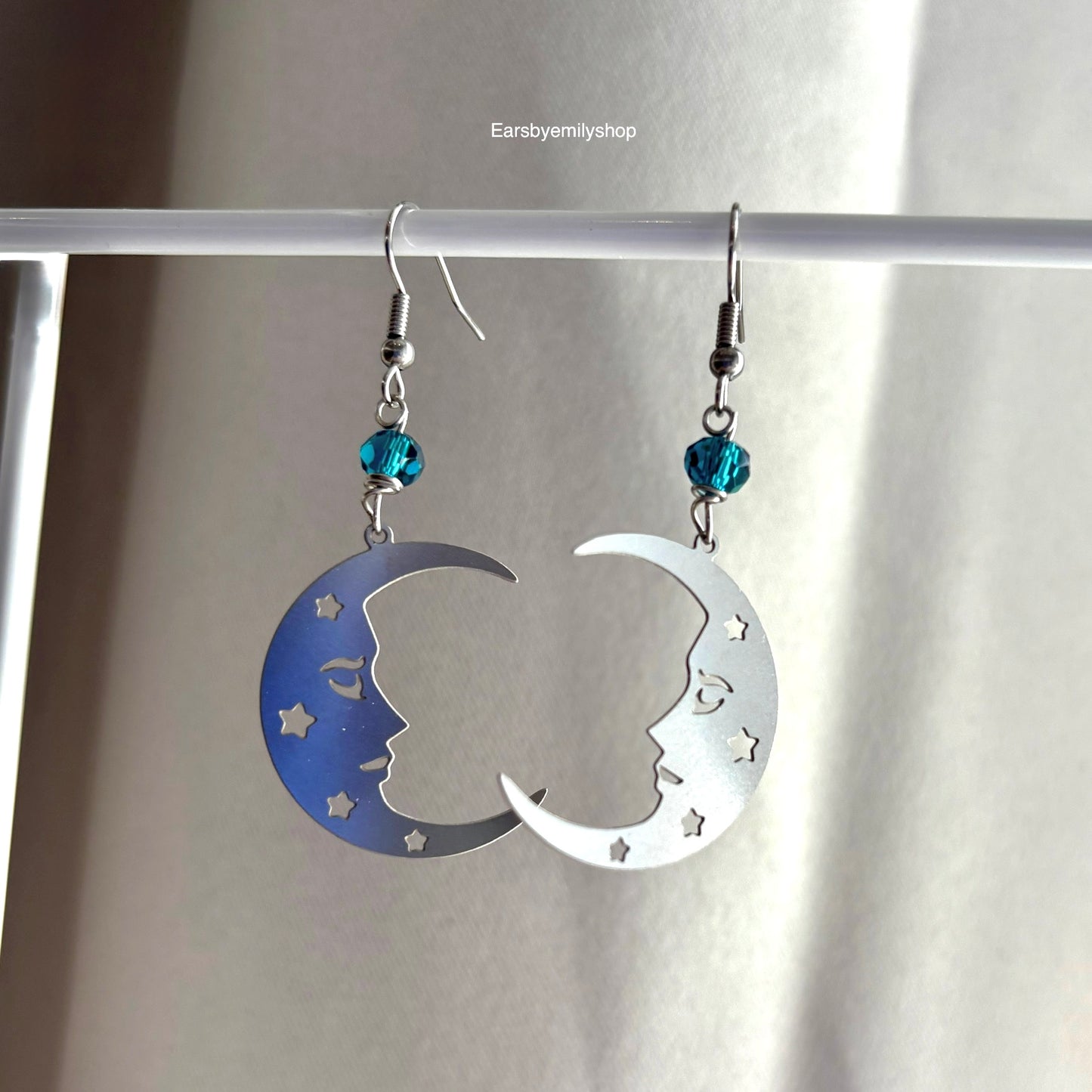 Stainless steel silver statement moon face earrings with blue beads