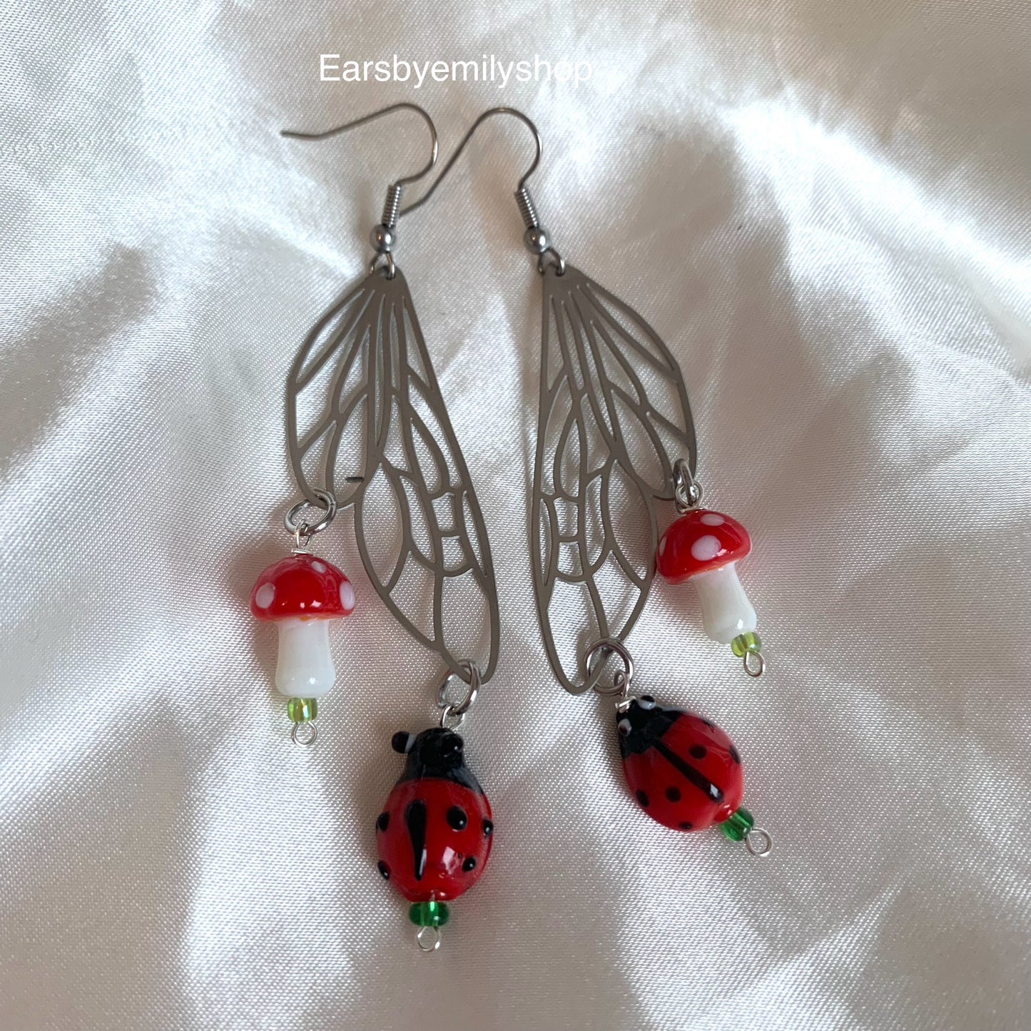 Silver stainless steel butterfly fairy wing earrings with mushrooms and ladybugs