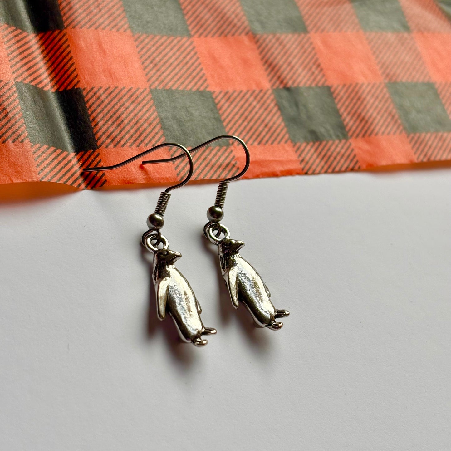 Silver dangle Christmas penguin earrings