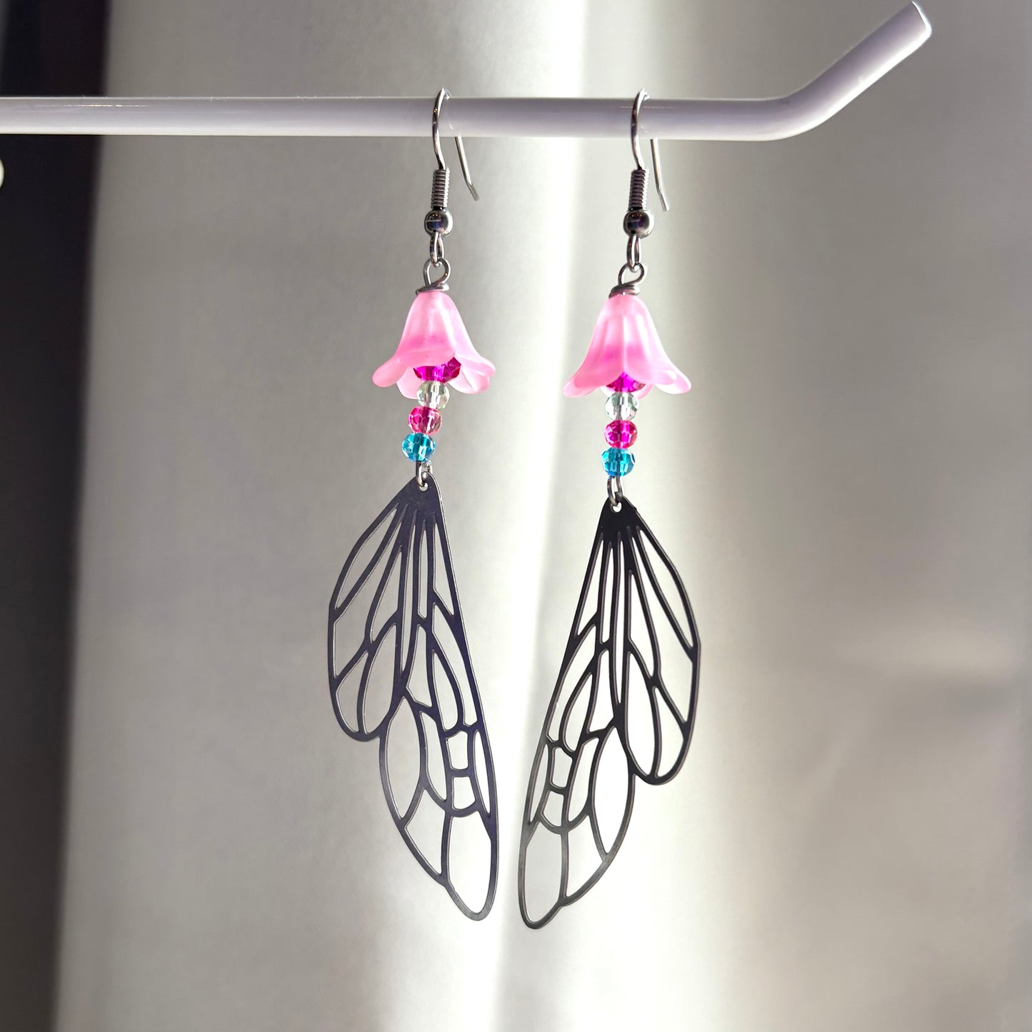 Stainless steel silver fairy wing dangle earrings with pink flowers and colourful beads