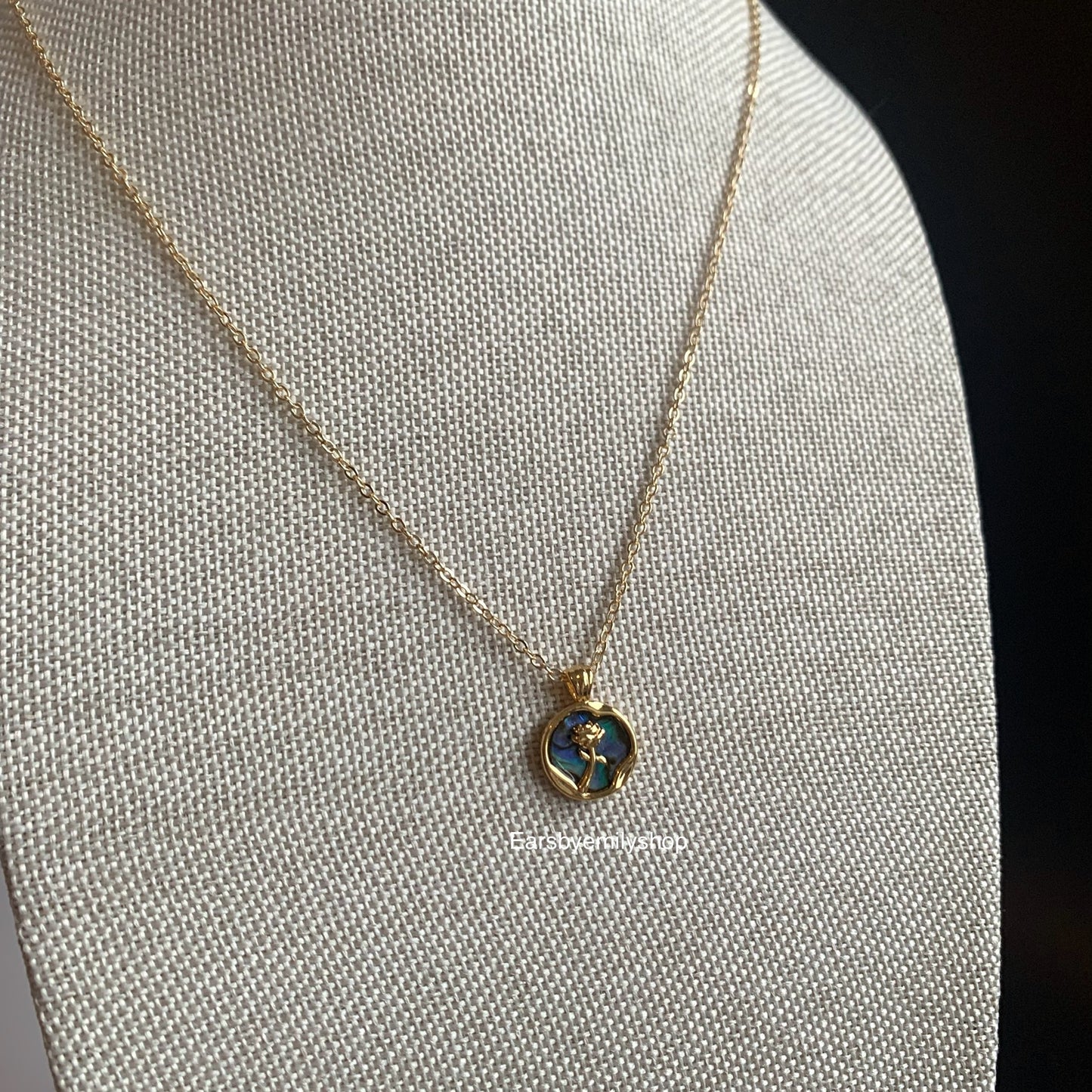 Gold plated circle mother of pearl with rose pendant necklace