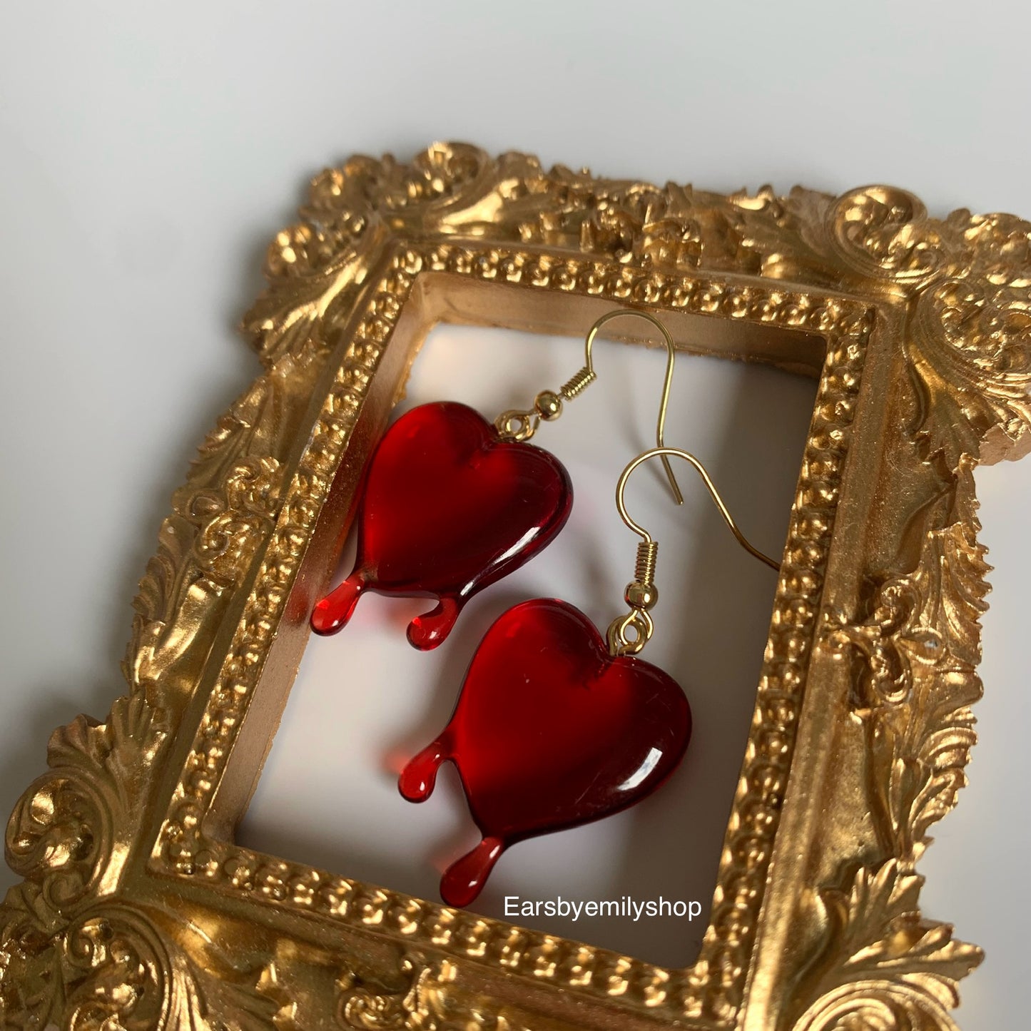 Dark red dripping heart gold earrings