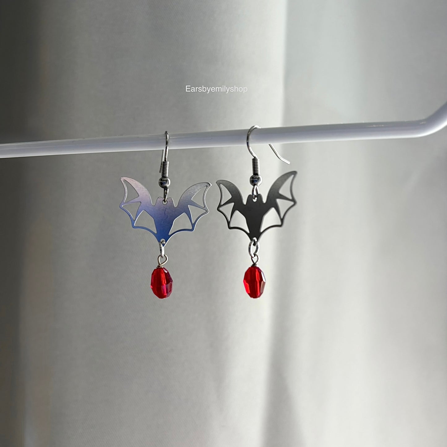 Stainless steel bat with red bead hypoallergenic earrings