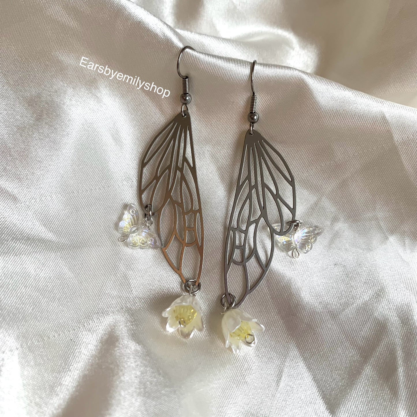 Silver stainless steel butterfly fairy wing earrings with yellow flowers