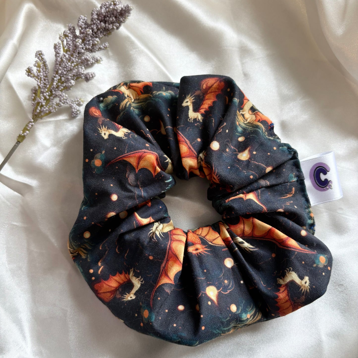 Big handmade fantasy book inspired dragon navy and orange scrunchie