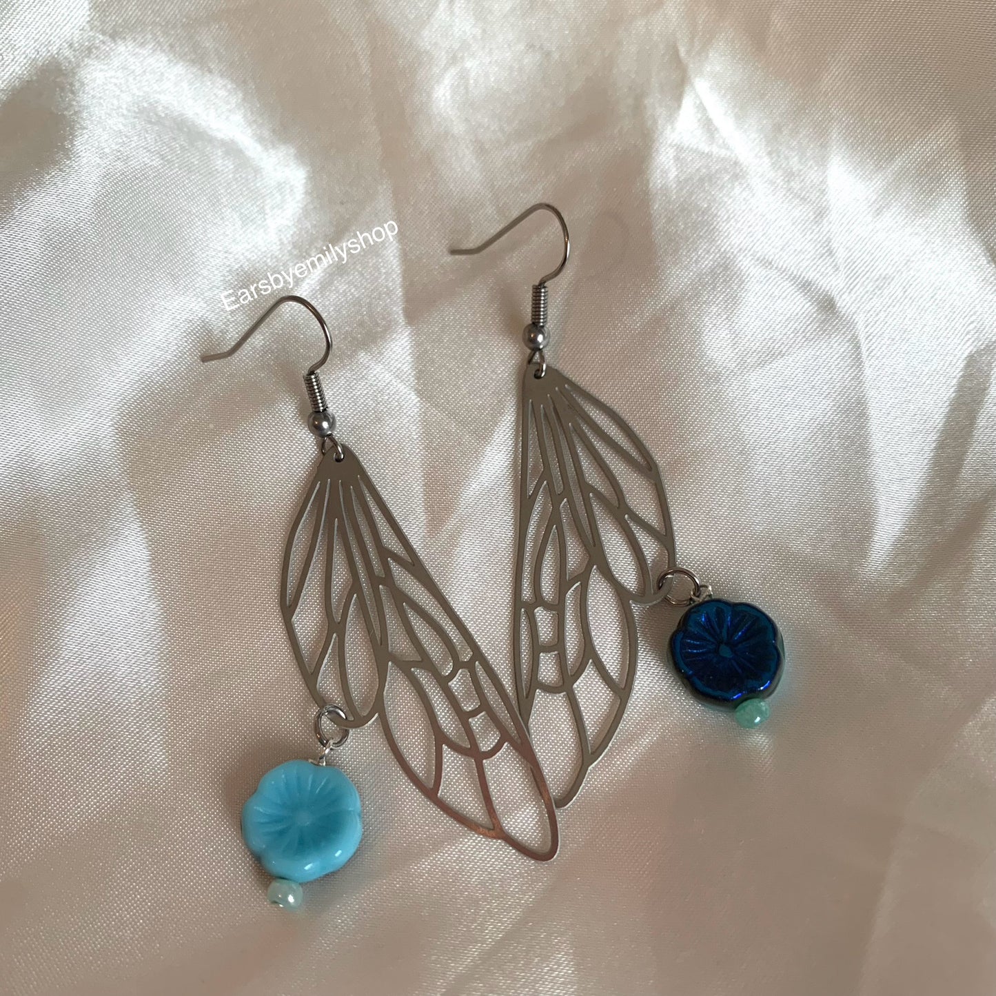 Silver stainless steel butterfly fairy wing earrings with blue flowers