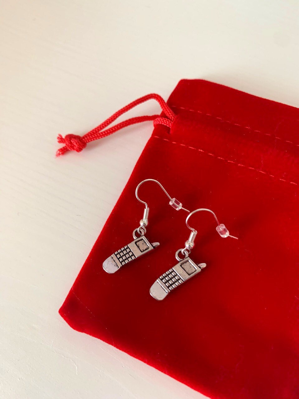 Silver mobile phone dangle earrings