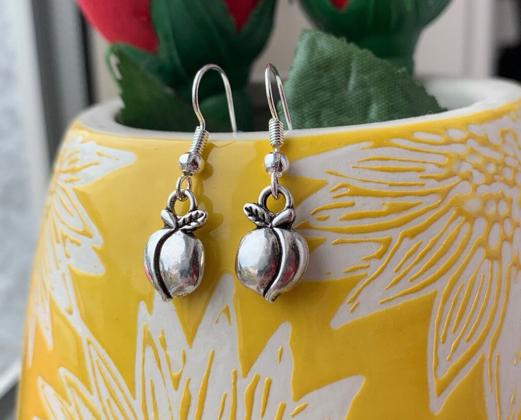 Silver peach fruit dangle earrings