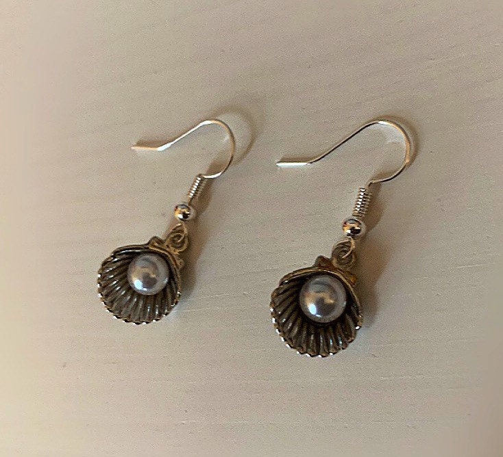 Silver clam with faux pearl dangle earrings