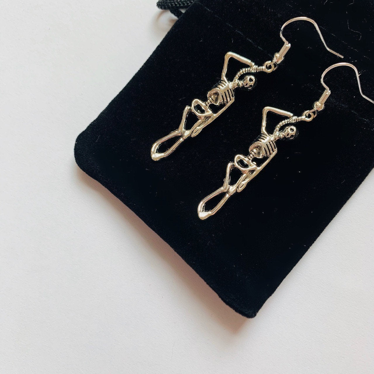 Silver hanging skeleton halloween earrings