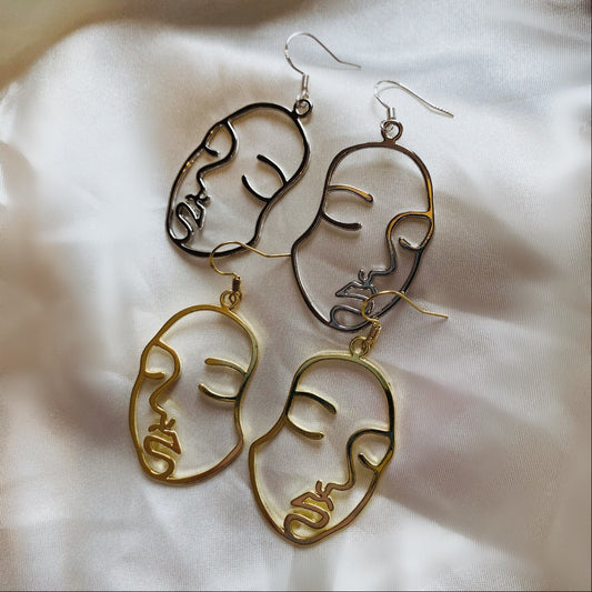 Silver or gold face outline earrings