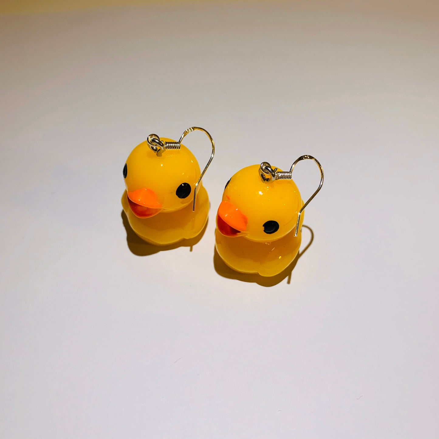 Yellow rubber duck drop dangle earrings on silver plated hook