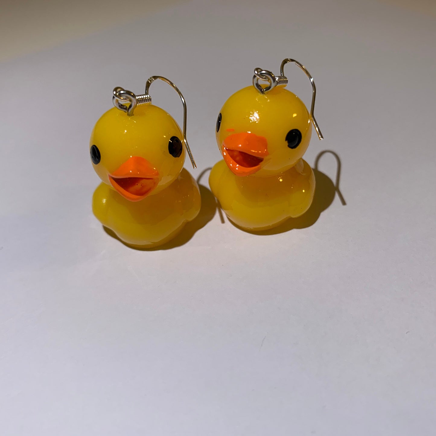 Yellow rubber duck drop dangle earrings on silver plated hook