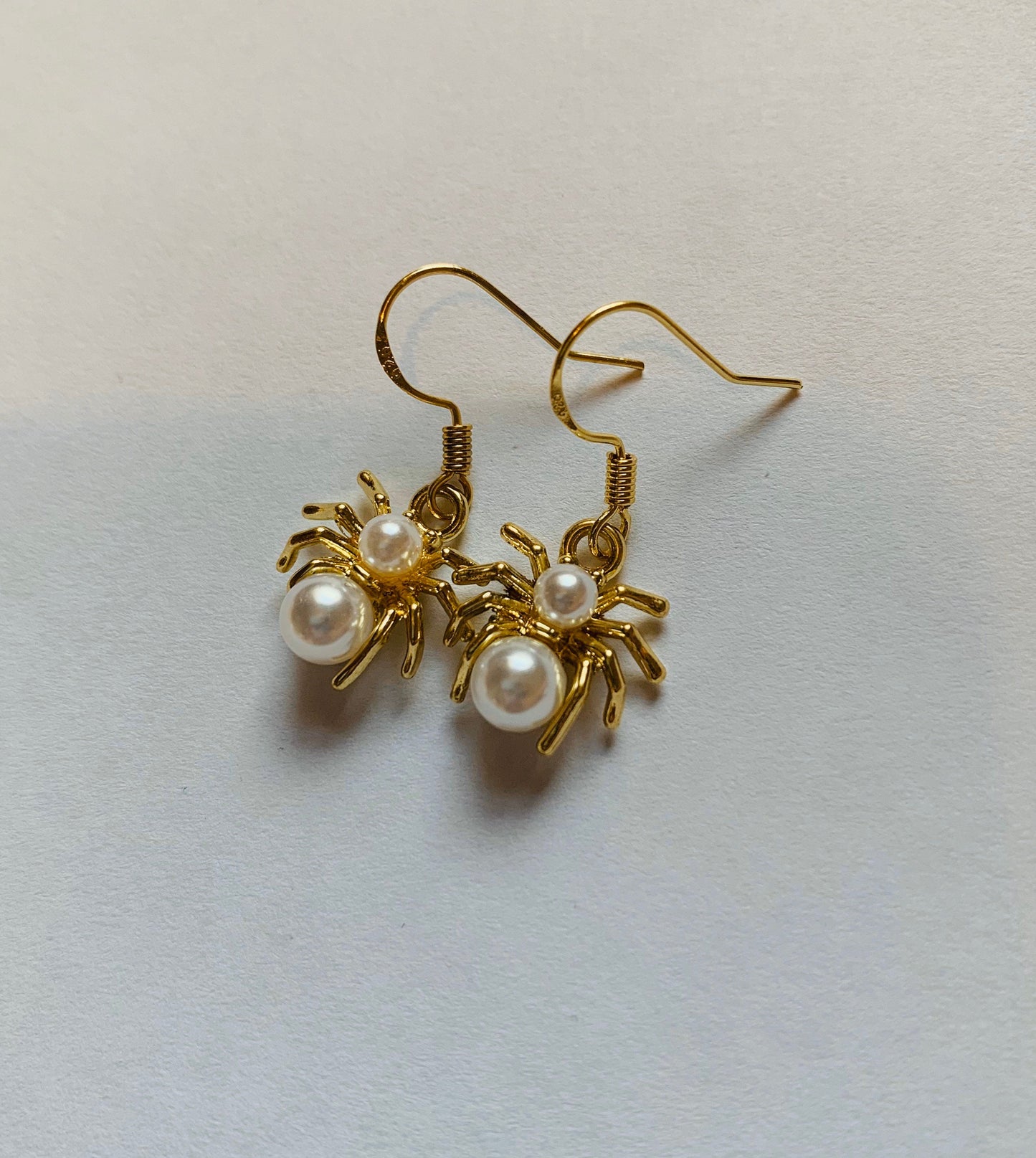 Gold spider faux pearl halloween earrings