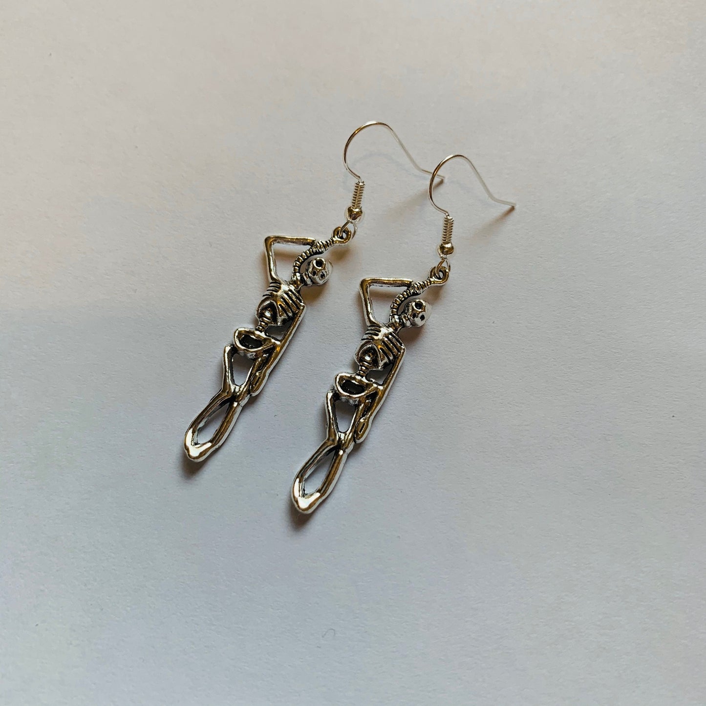 Silver hanging skeleton halloween earrings