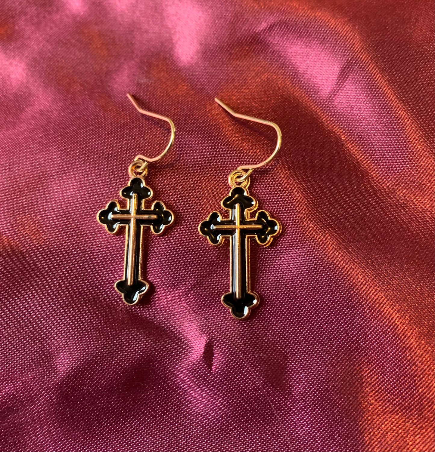 Black and gold cross dangle earrings