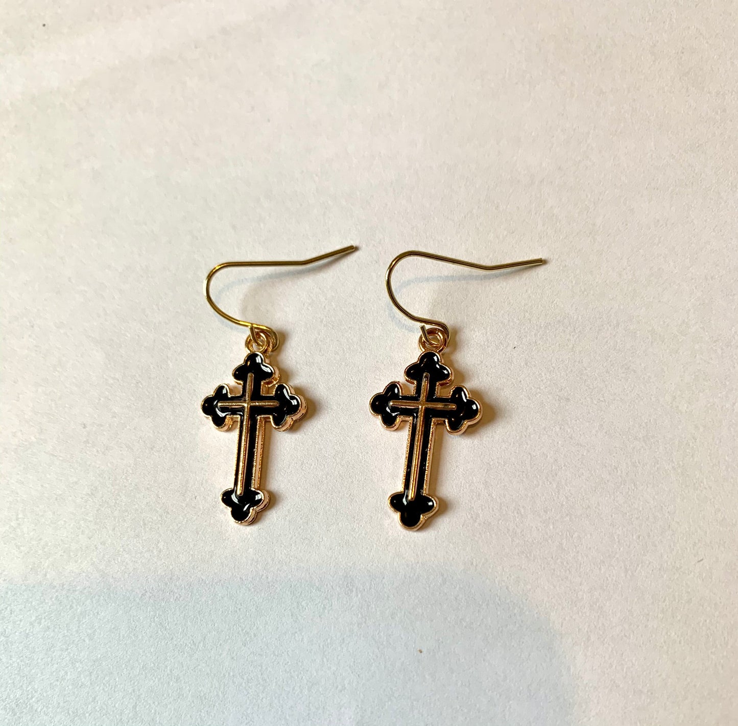 Black and gold cross dangle earrings