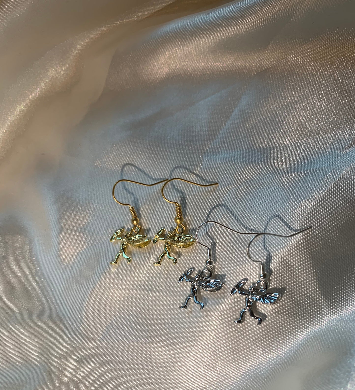 Silver or gold little cupid dangle earrings