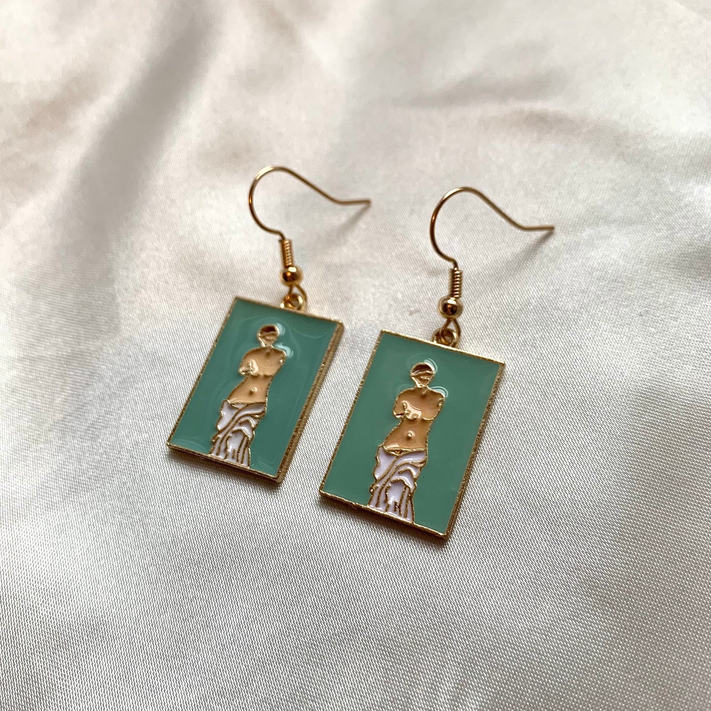 Green greek statue bust gold earrings