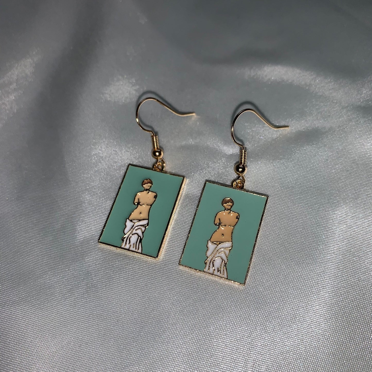 Green greek statue bust gold earrings