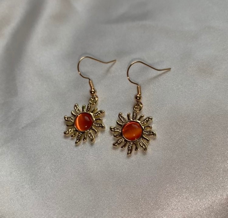 Gold orange sun earrings with orange centre dangle earrings