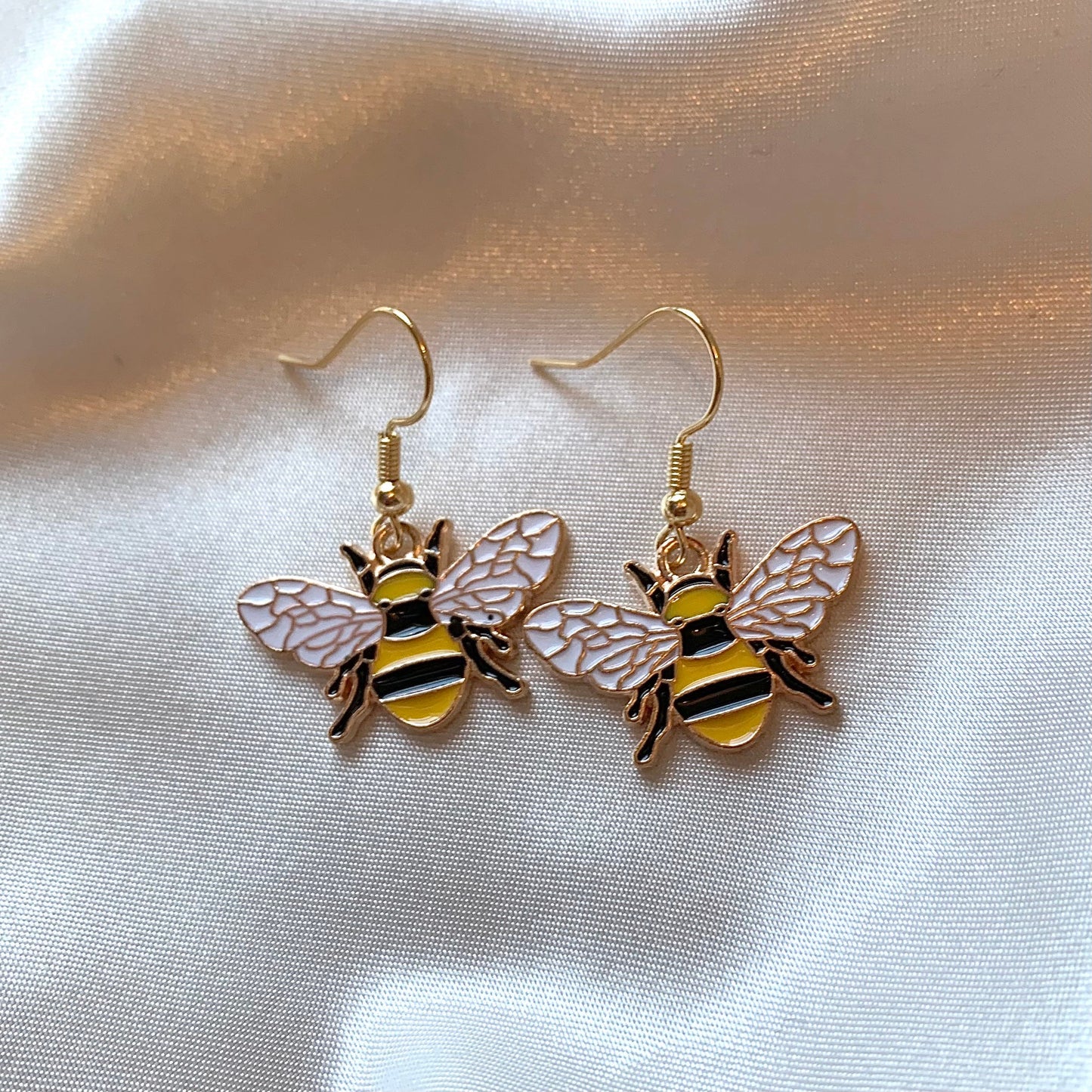 Yellow and black gold bumble bee earrings