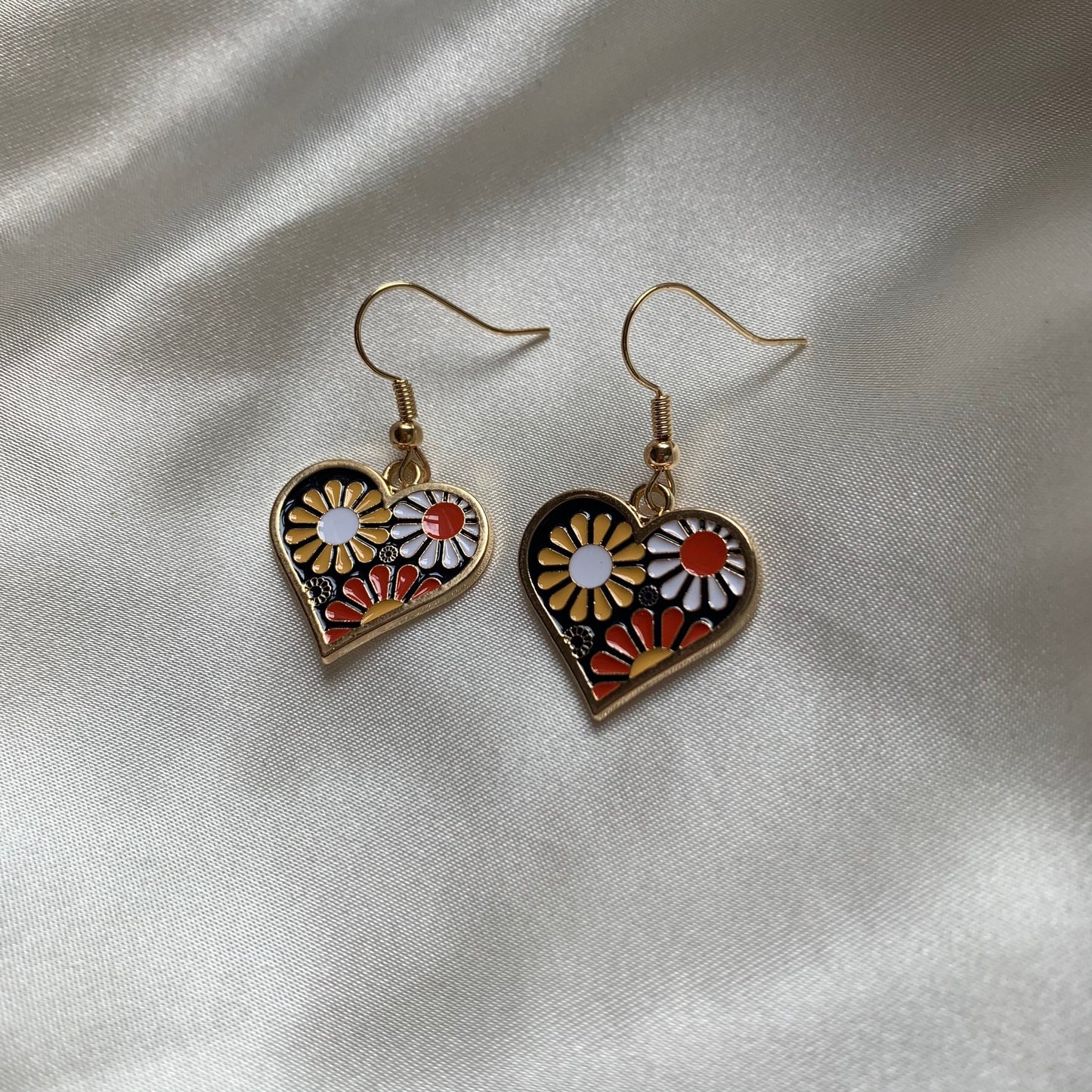 Flower in heart gold dangle earrings