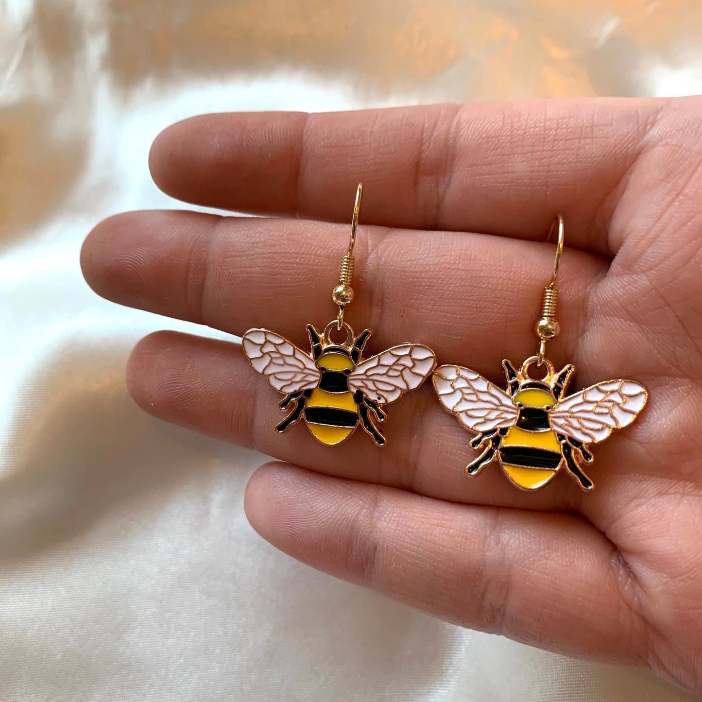 Yellow and black gold bumble bee earrings