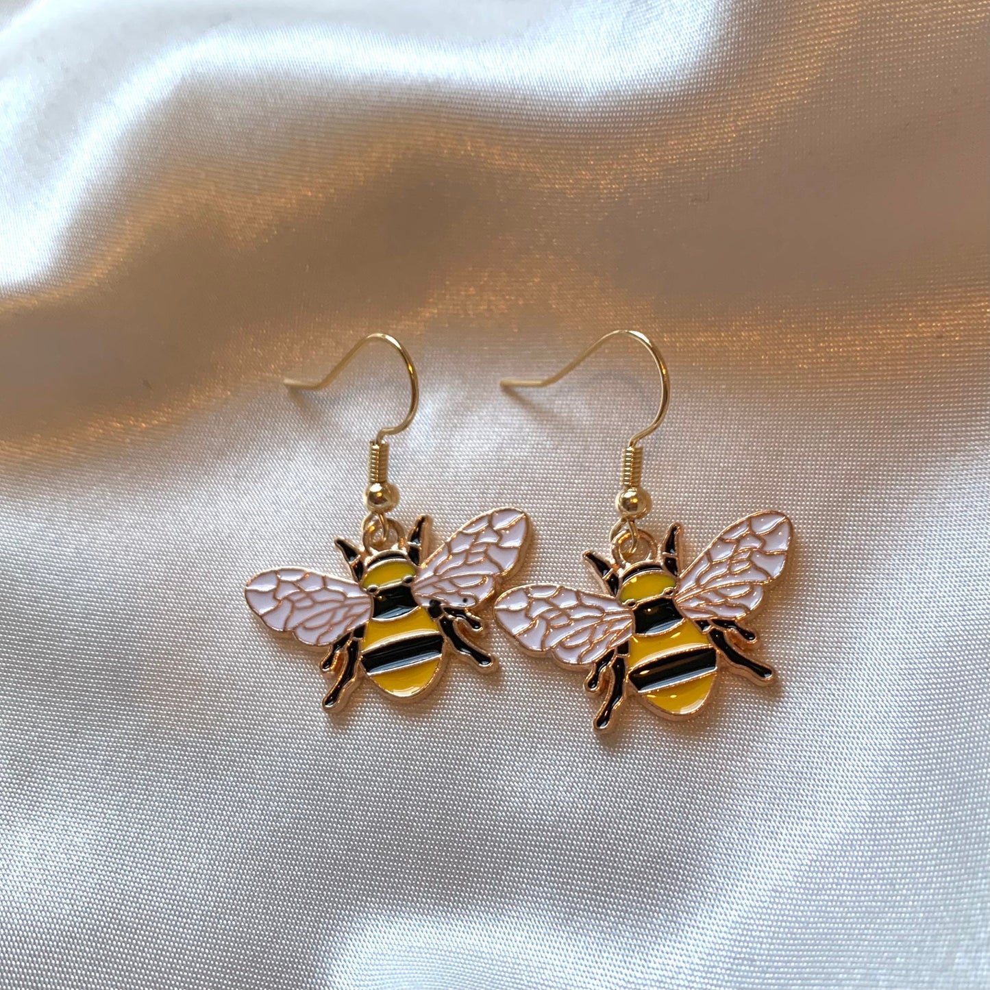 Yellow and black gold bumble bee earrings