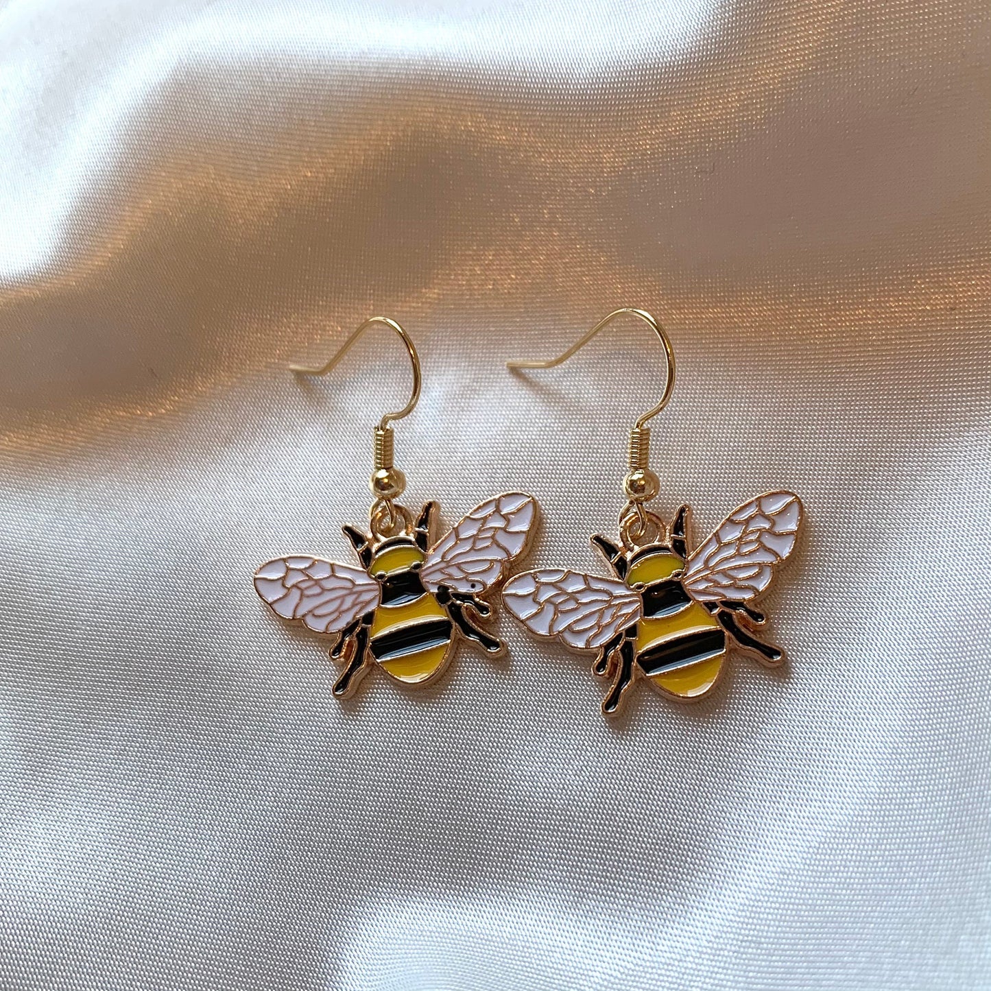 Yellow and black gold bumble bee earrings