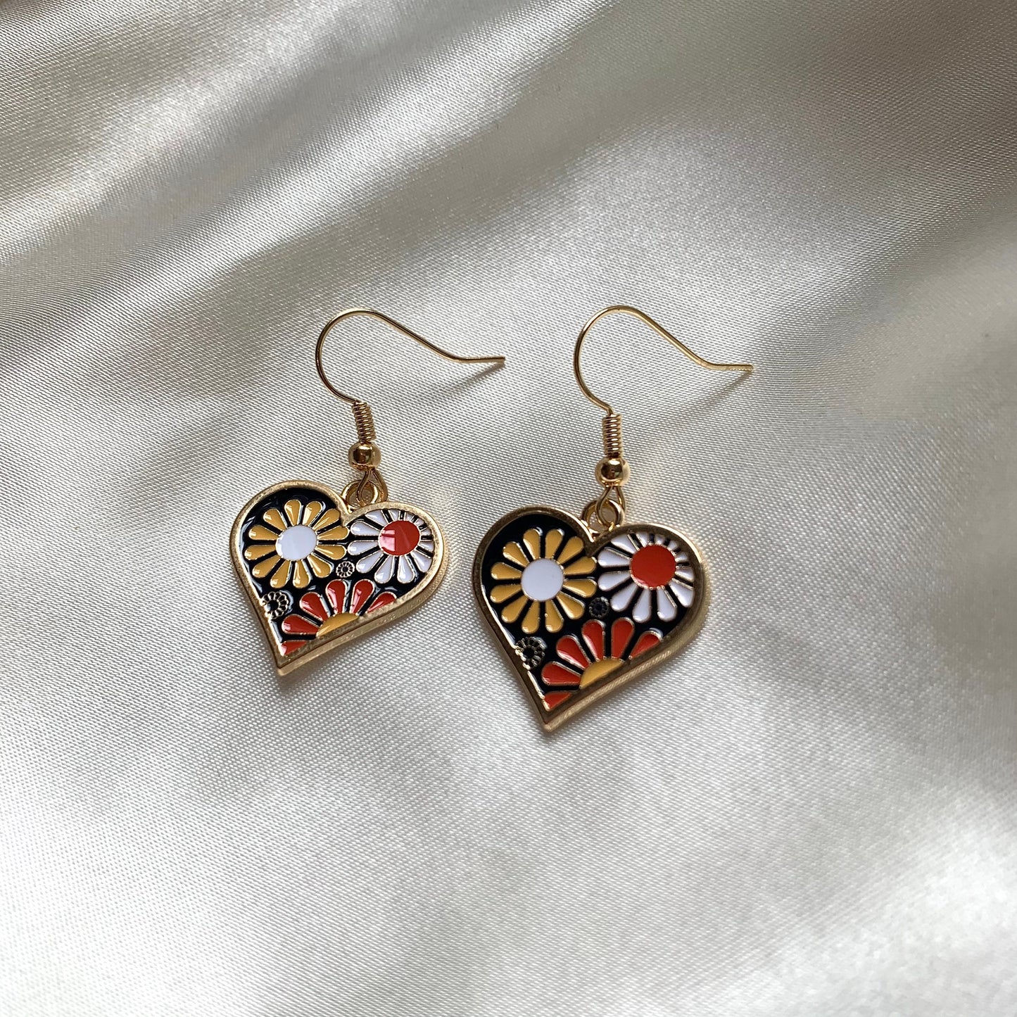 Flower in heart gold dangle earrings