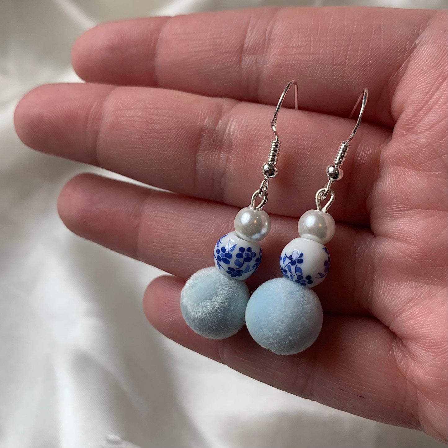 Faux pearl, ceramic blue and white bead and fuzzy light blue ball handmade silver plated earrings