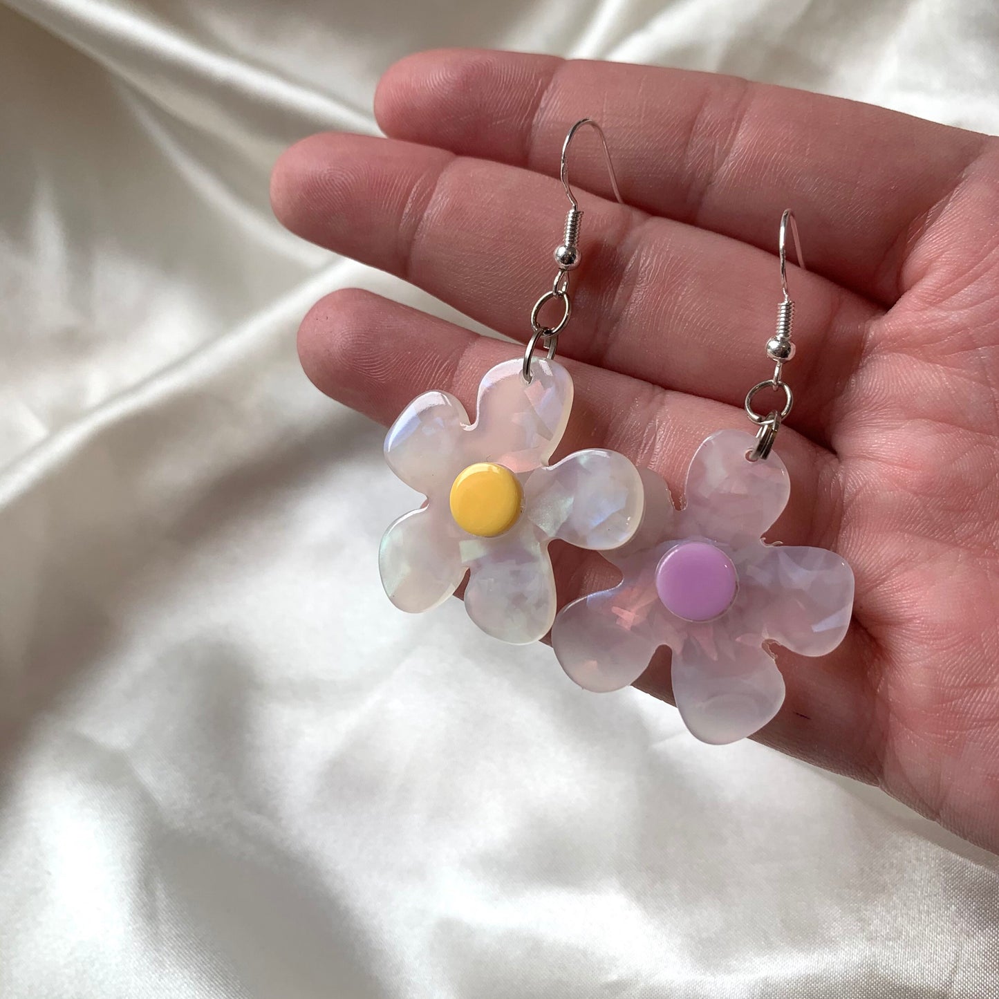 White and yellow or purple opaque flower earrings