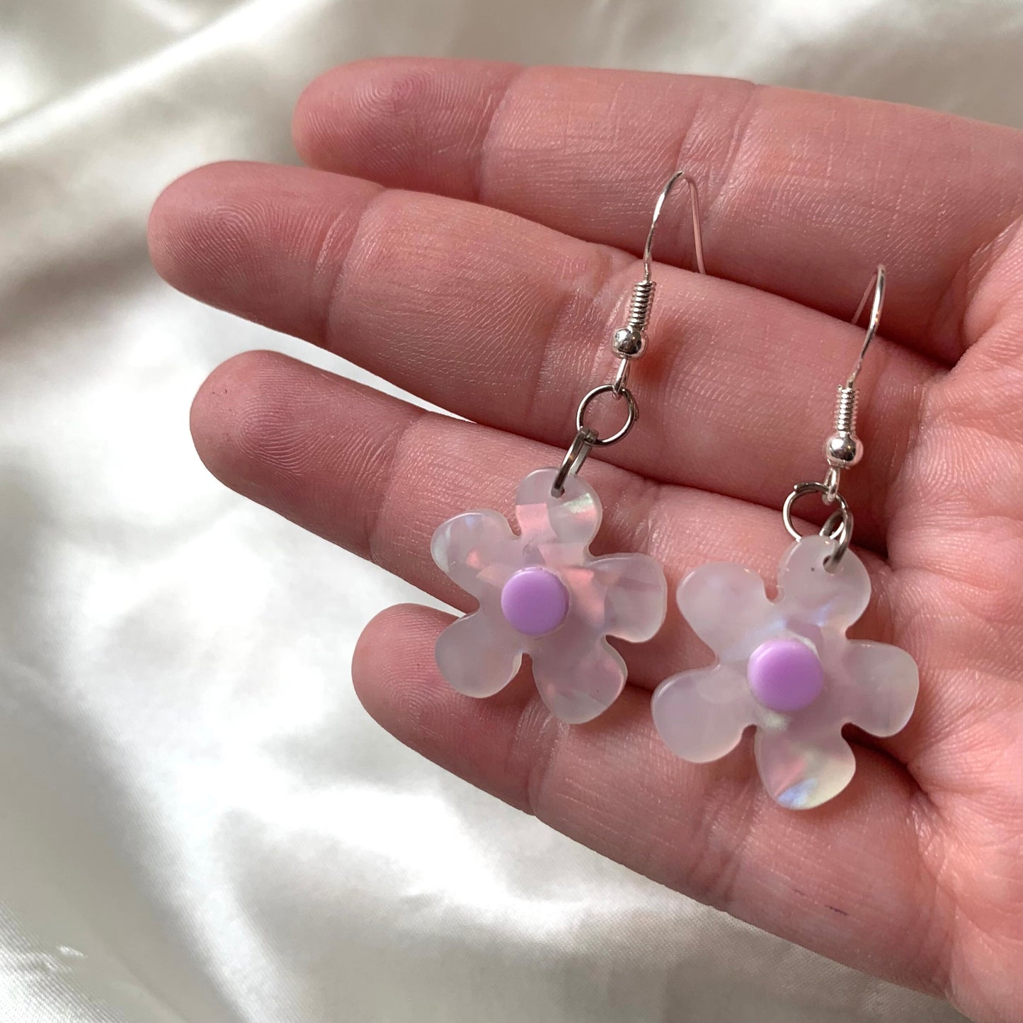 White and yellow or purple opaque flower earrings