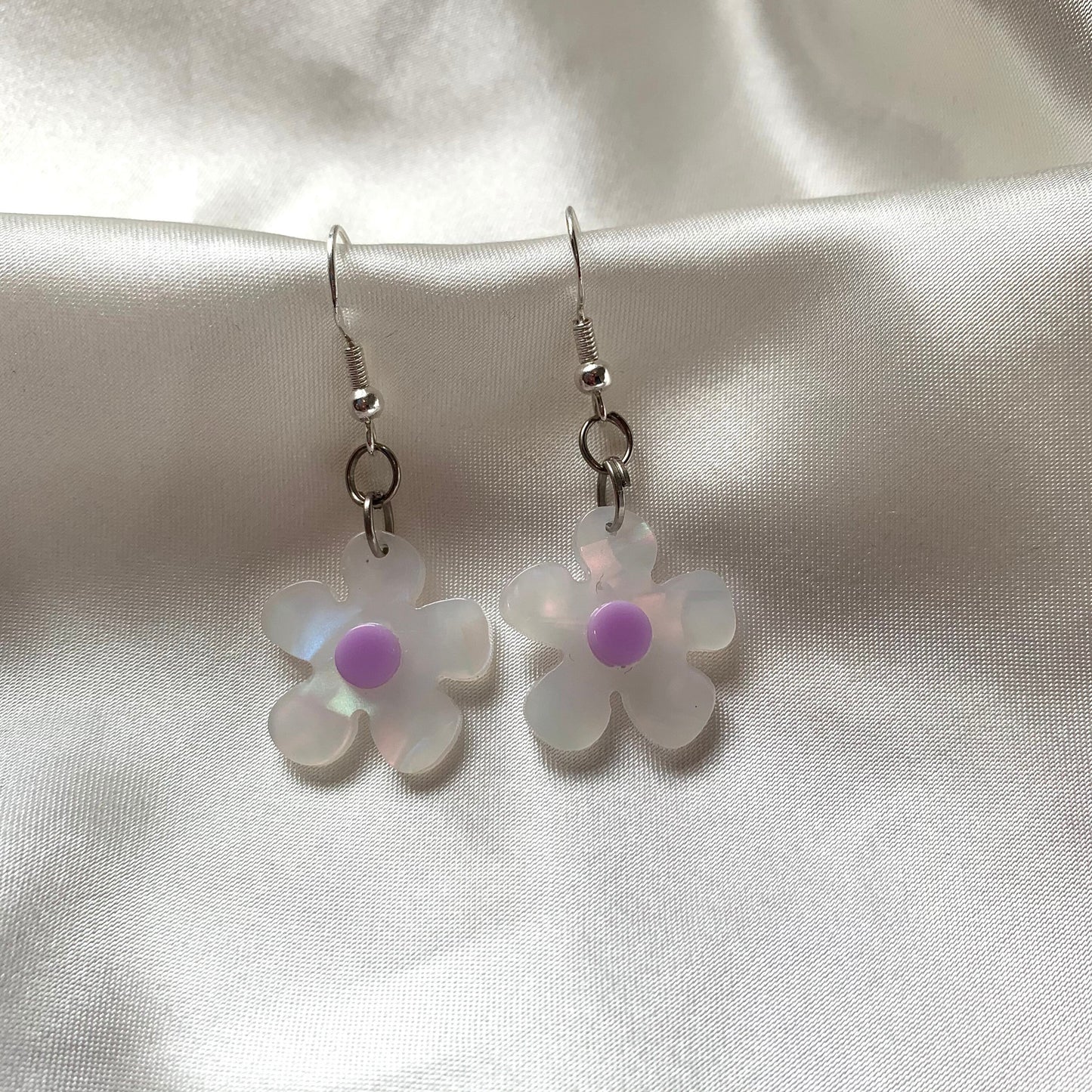 White and yellow or purple opaque flower earrings