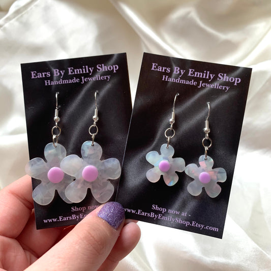 White and yellow or purple opaque flower earrings