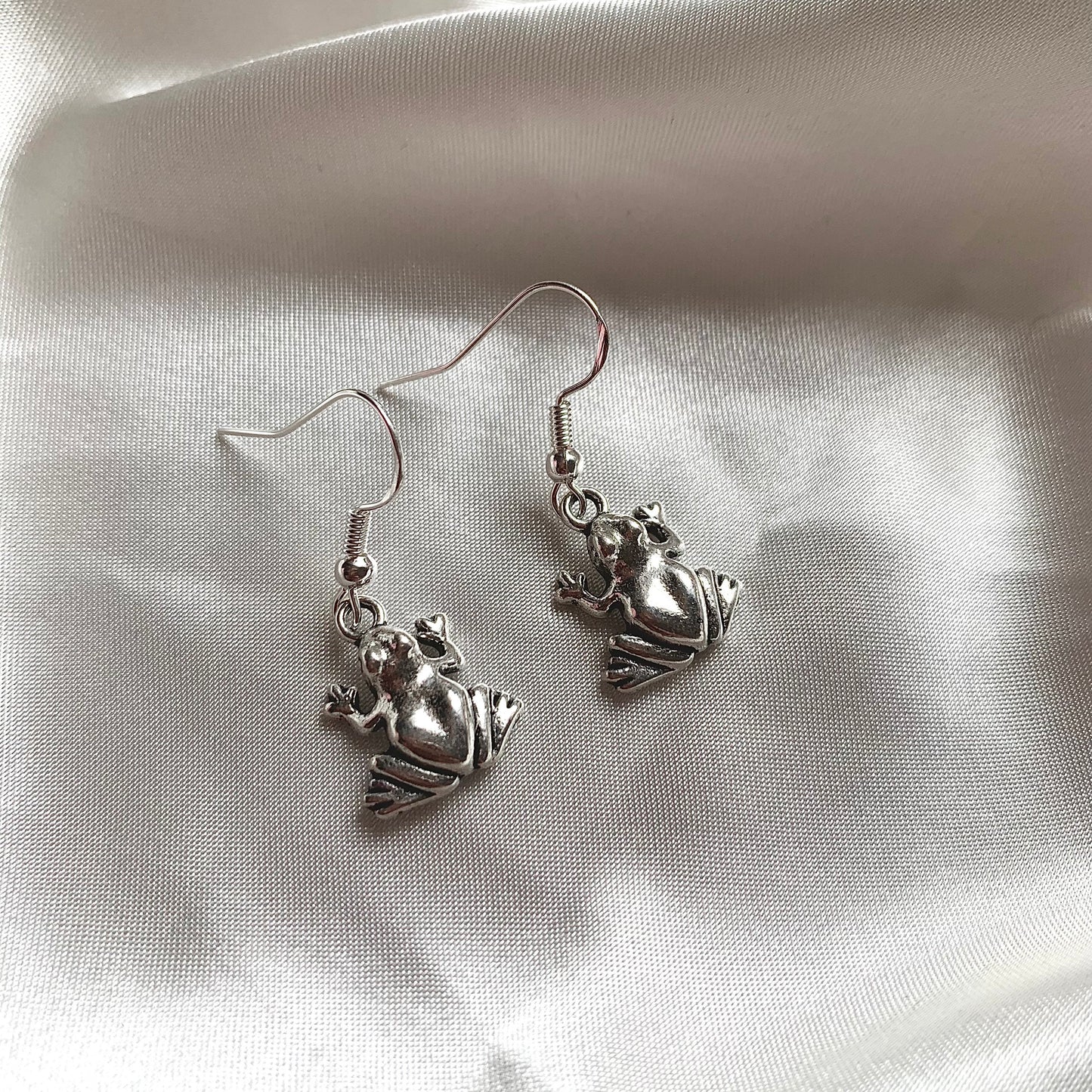 Silver plated frog earrings