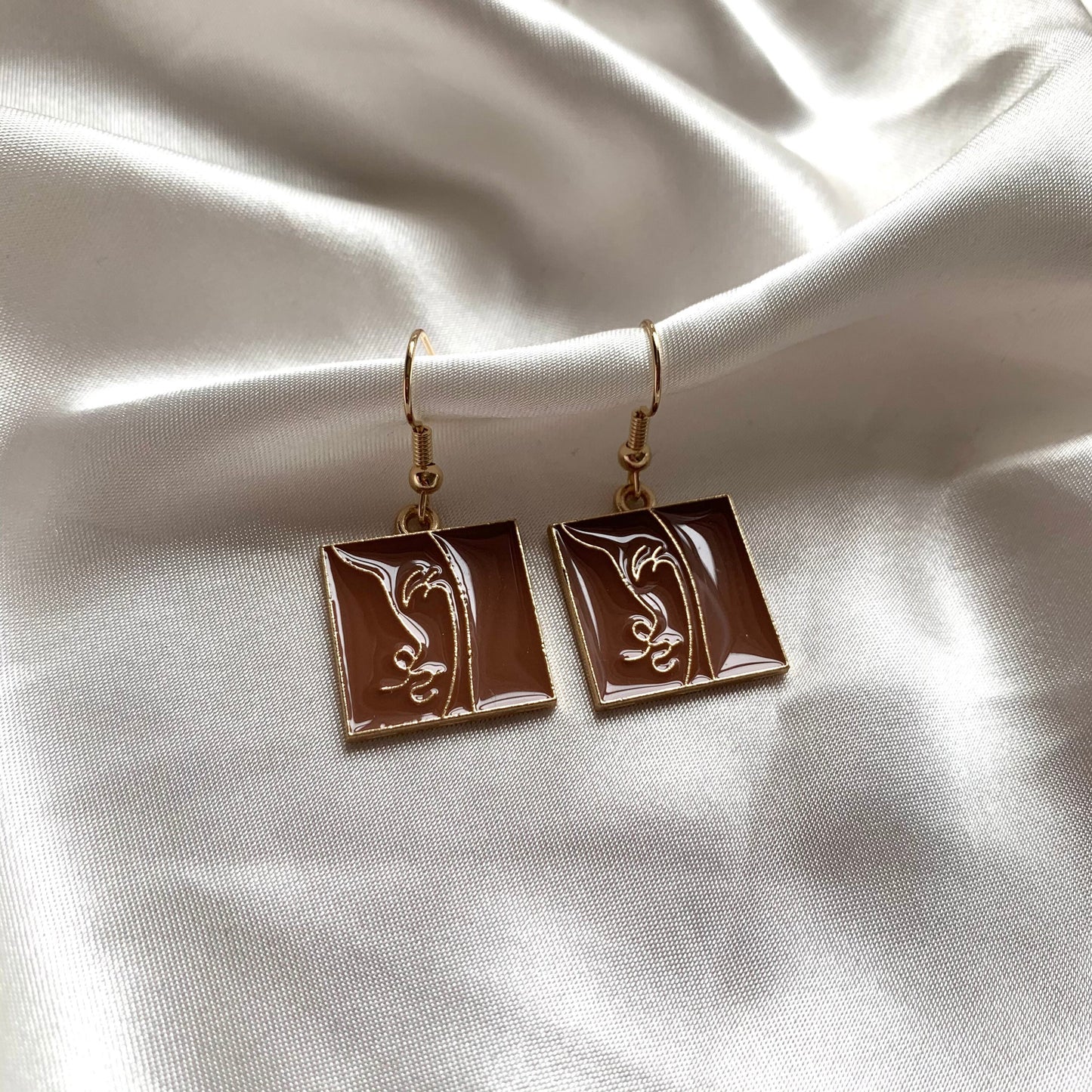 Abstract brown face square gold earrings