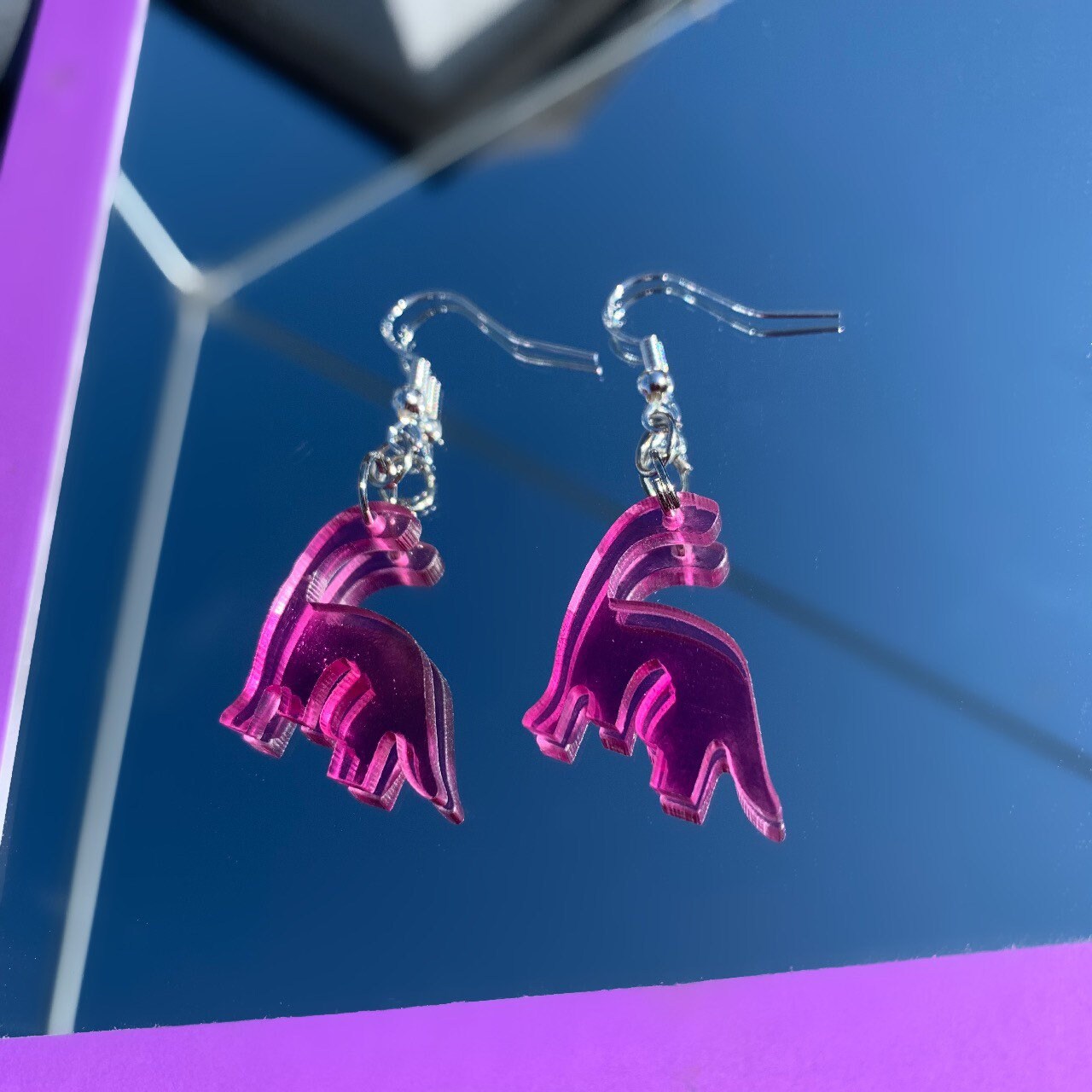 Cool quirky fun colourful acrylic dinosaur handmade drop dangle earrings on silver plated hooks