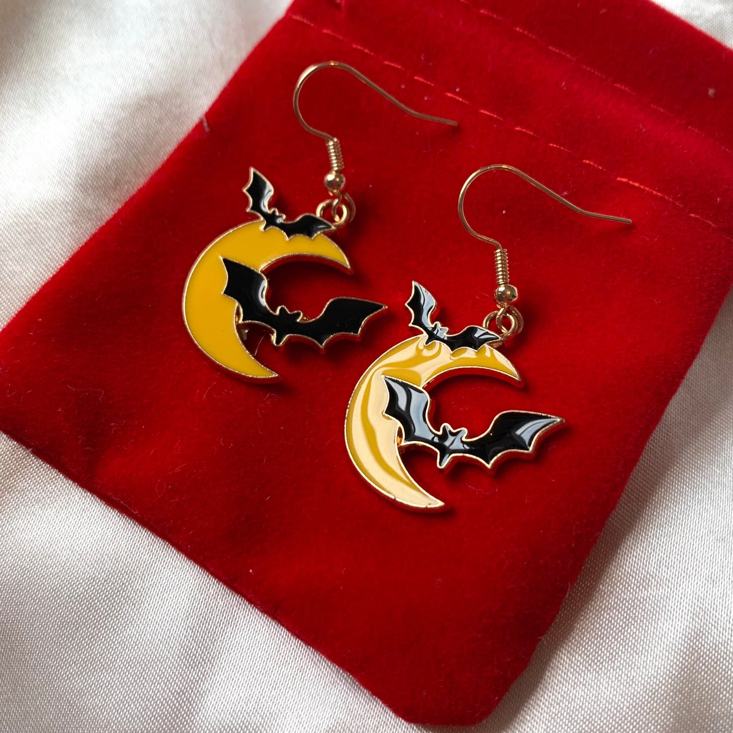 Yellow moon with bat gold halloween earrings