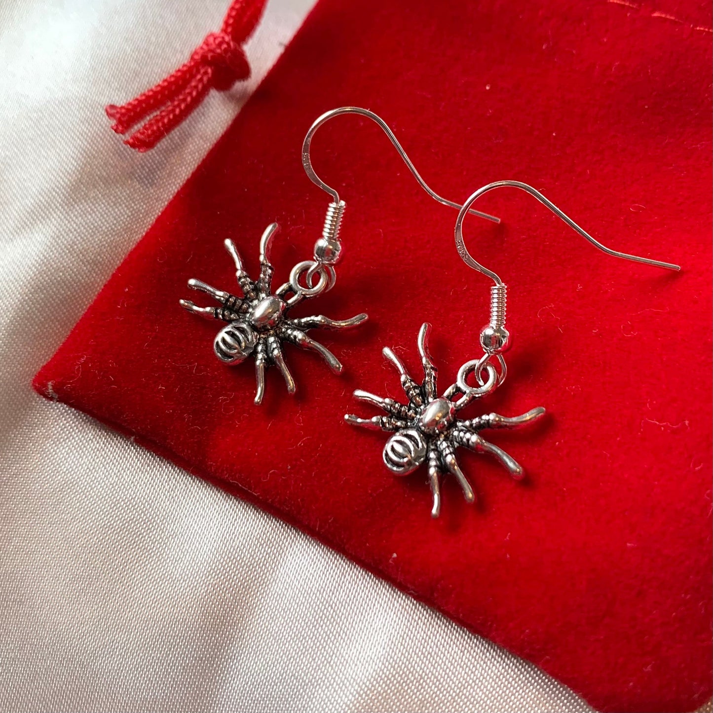 Silver spider halloween earrings