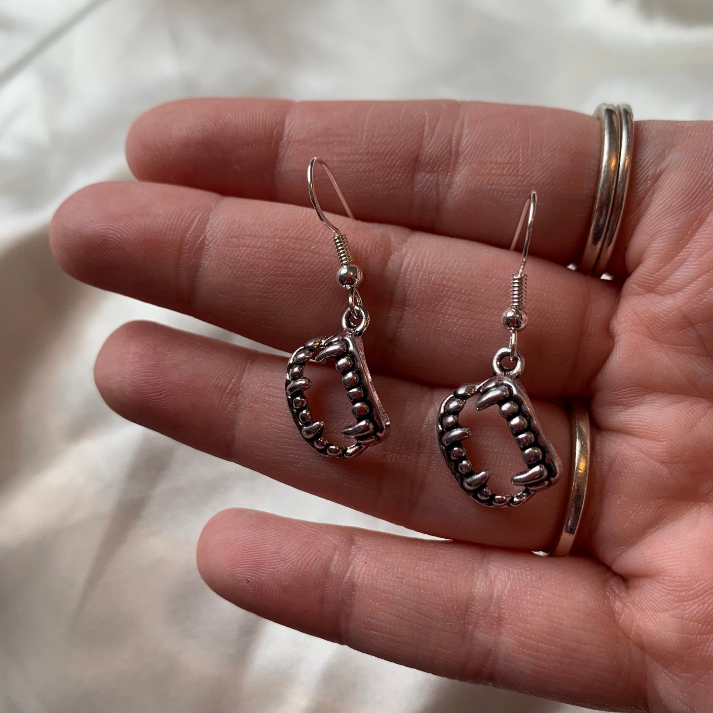 Silver halloween vampire fang earrings