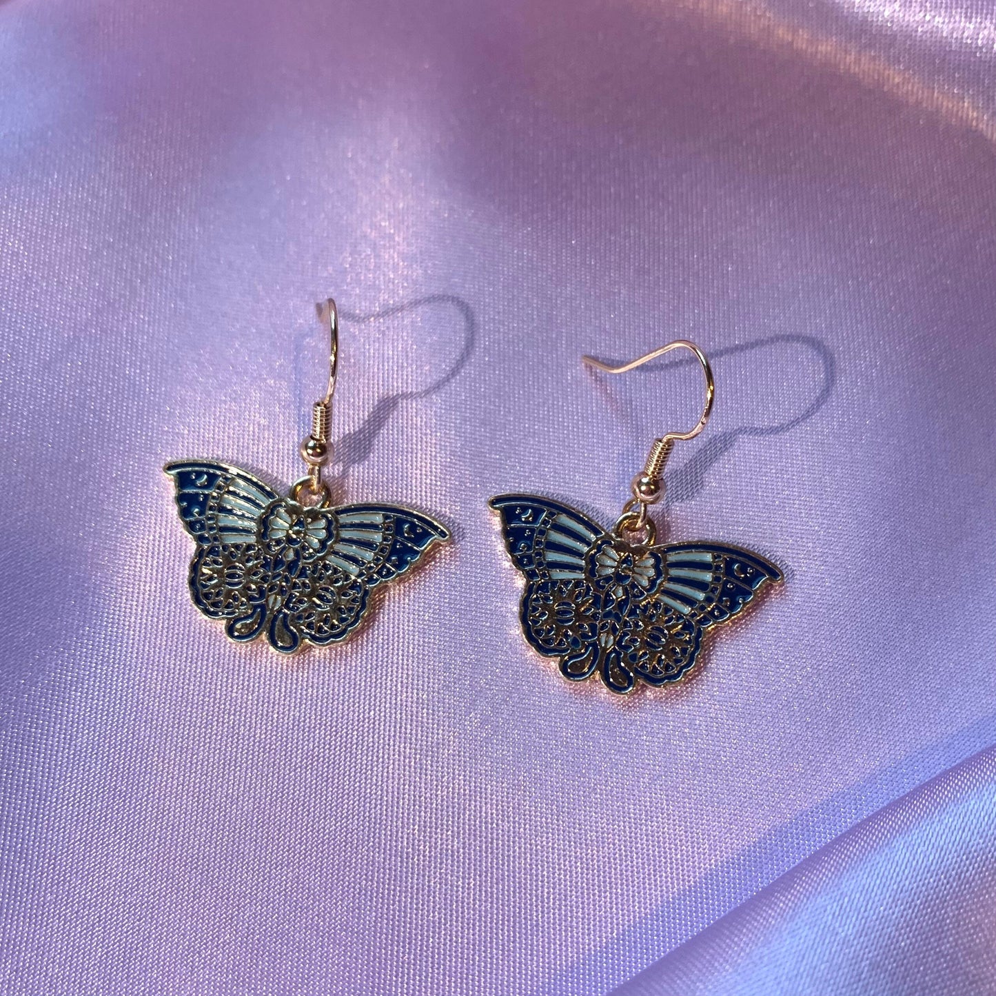 Blue and gold moth butterfly dangle earrings