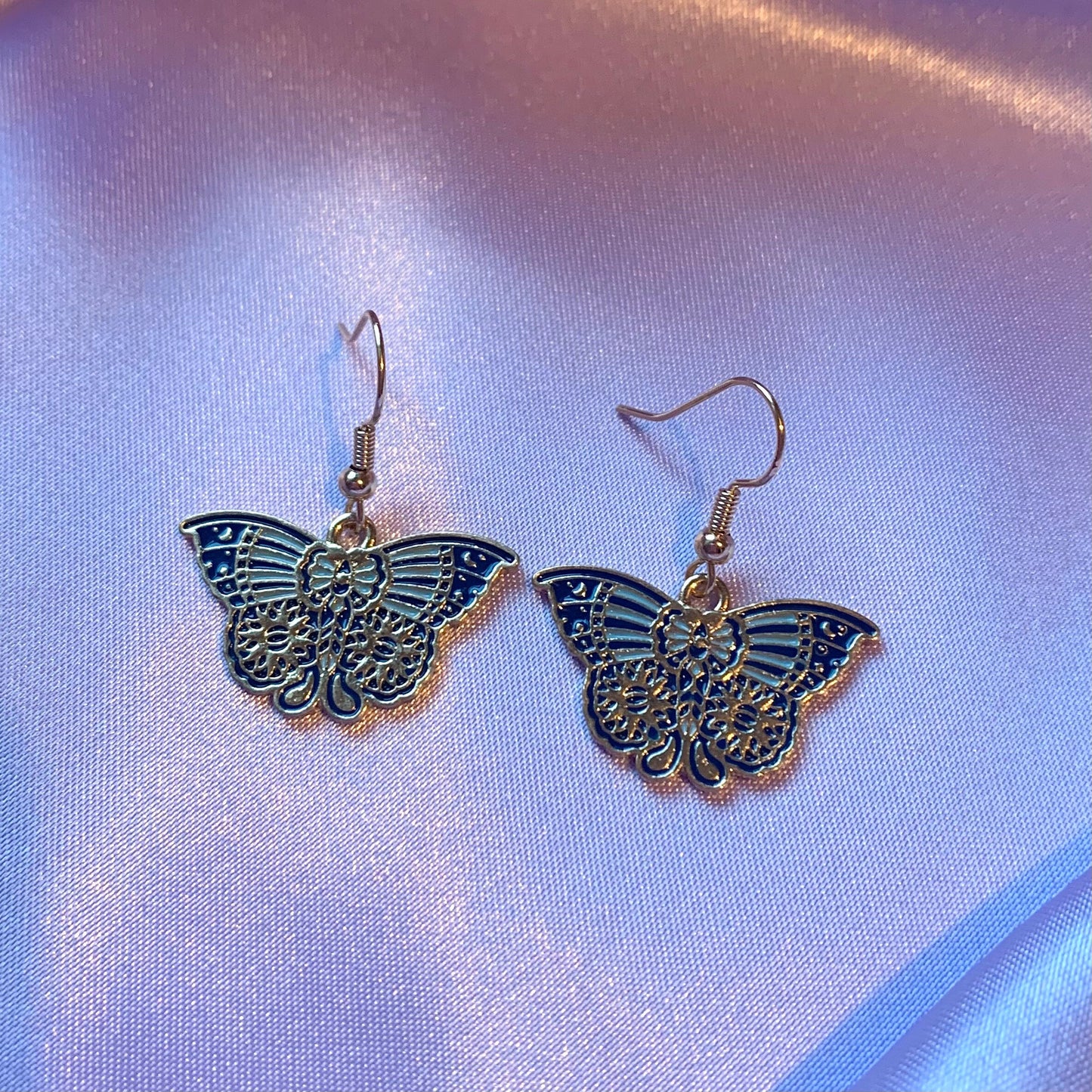 Blue and gold moth butterfly dangle earrings